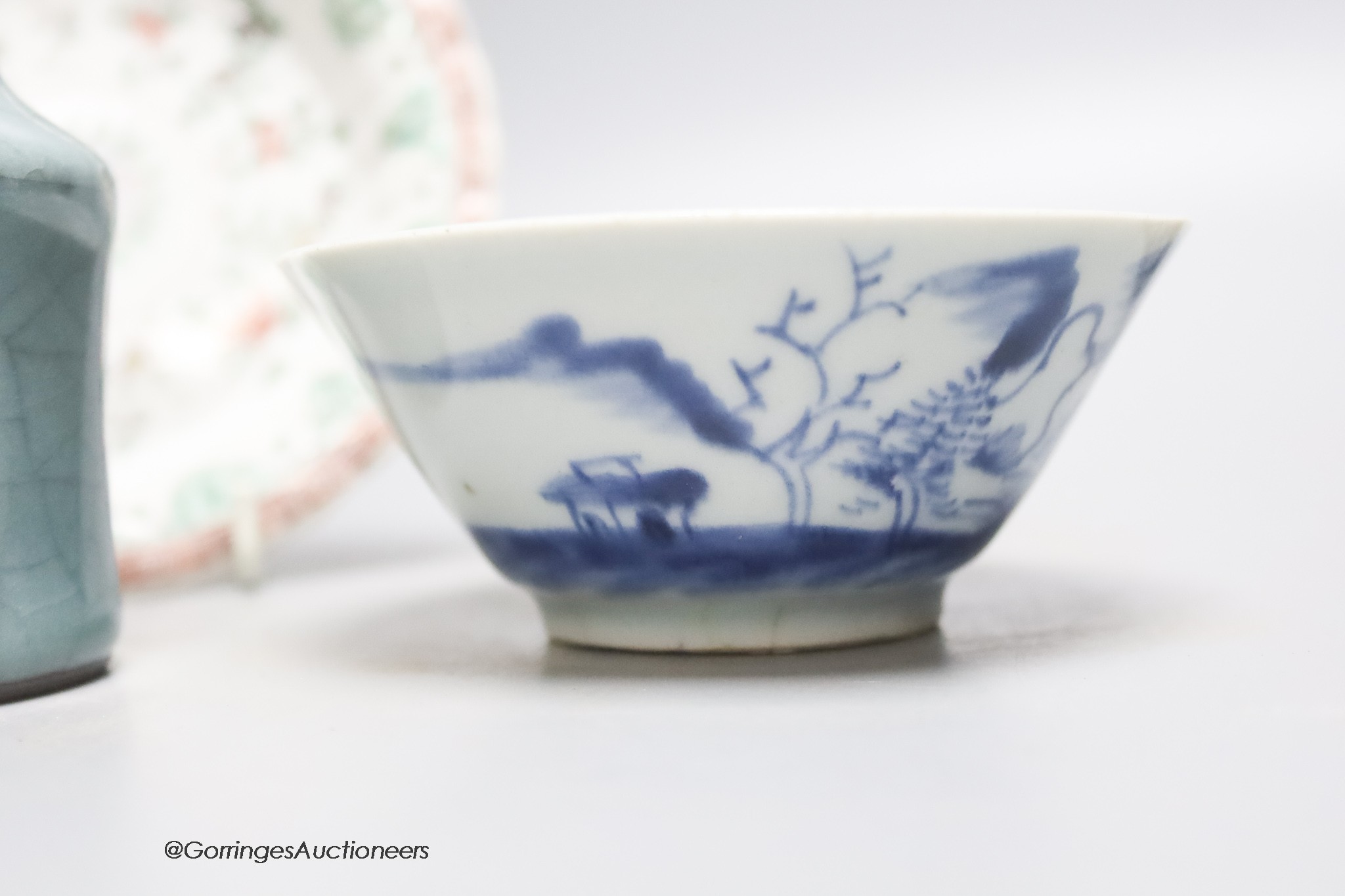 A miniature Chinese crackleglaze vase together with a blue and white bowl and a famille verte dish, diameter 13cm